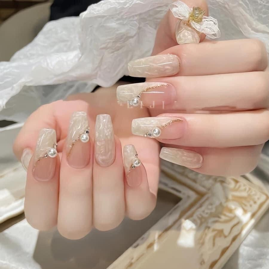 Top 50+ mẫu nail cô dâu thanh lịch giúp nàng nổi bật 44 Nail Cô Dâu Màu Trắng
